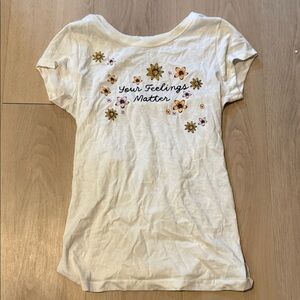 Wound Up Cream Tee with Floral Accents